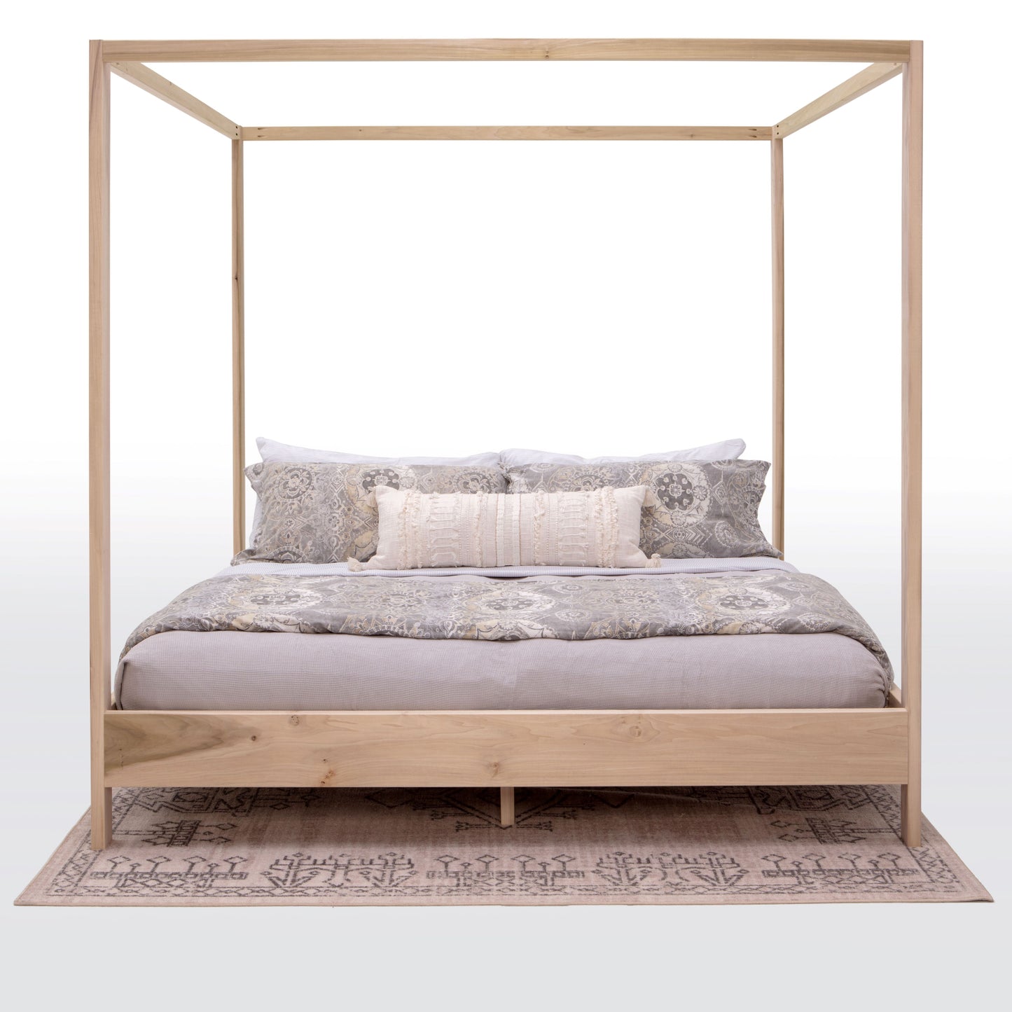 An elegant canopy bed made entirely of rich, polished wood, exuding timeless charm and sophistication. The bed's frame boasts intricate craftsmanship with ornate detailing and smooth, curved lines. Placed in a spacious bedroom with soft lighting and plush furnishings, this wooden canopy bed creates a serene and inviting retreat for rest and relaxation.