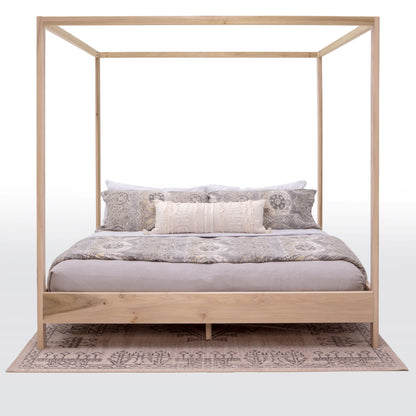 An elegant canopy bed made entirely of rich, polished wood, exuding timeless charm and sophistication. The bed's frame boasts intricate craftsmanship with ornate detailing and smooth, curved lines. Placed in a spacious bedroom with soft lighting and plush furnishings, this wooden canopy bed creates a serene and inviting retreat for rest and relaxation.